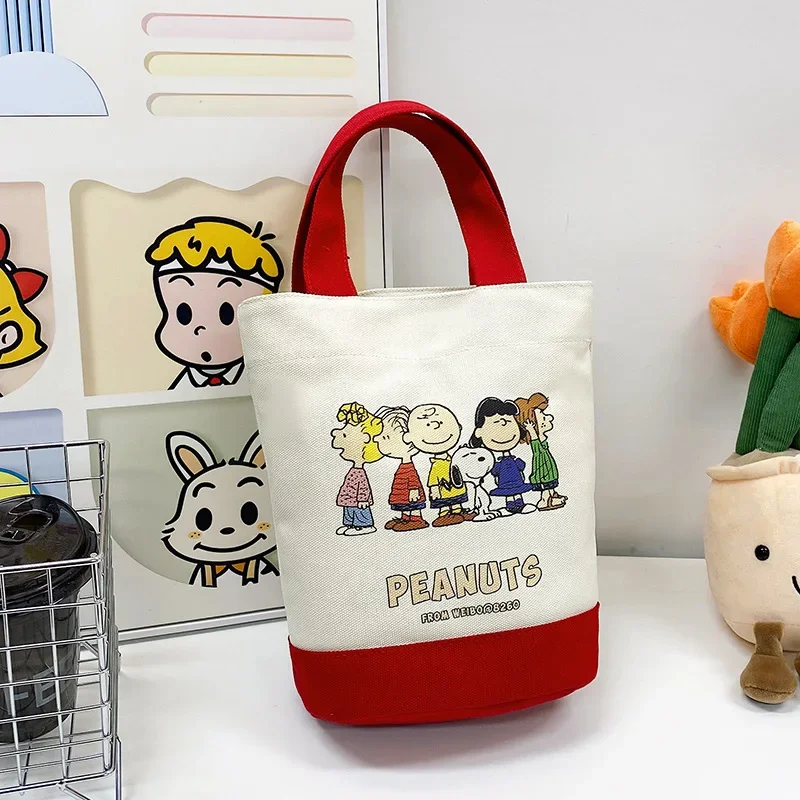 2026 Neue Mode Heiße Snoopy Bucket Bag Cartoon Canvas Tasche Bedruckte Handtasche Lunch Bag Modische Hot Mom Tasche – Detail 5