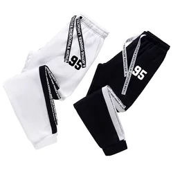 Męskie spodnie dresowe Moda Casual Print Wysokiej jakości czarne białe wszechstronne spodnie dresowe Outdoor Fitness Sport Jogging Pants