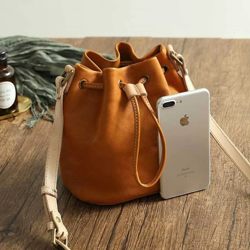 Johnature 2026 New Genuine Leather Bucket Bag Retro Women's Bag Handmade Drawstring Simple Shoulder Crossbody Bag