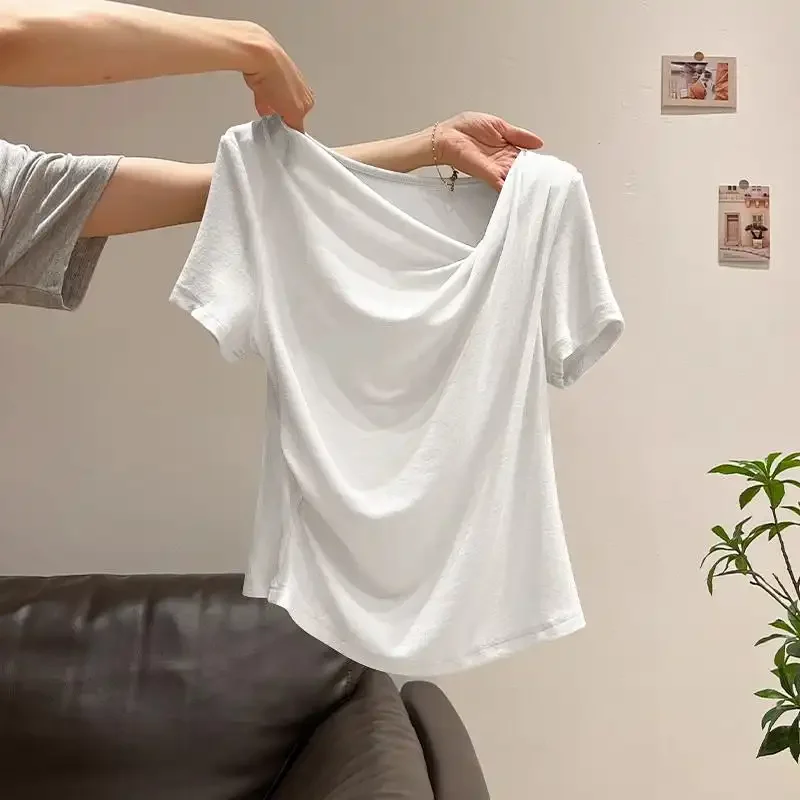 Damska bluzka z odkrytymi ramionami, asymetryczna, dopasowana, z nieregularnymi krótkimi rękawami, nowość na wiosnę i lato 2026, minimalistyczna, uniwersalna bluzka typu pulower.