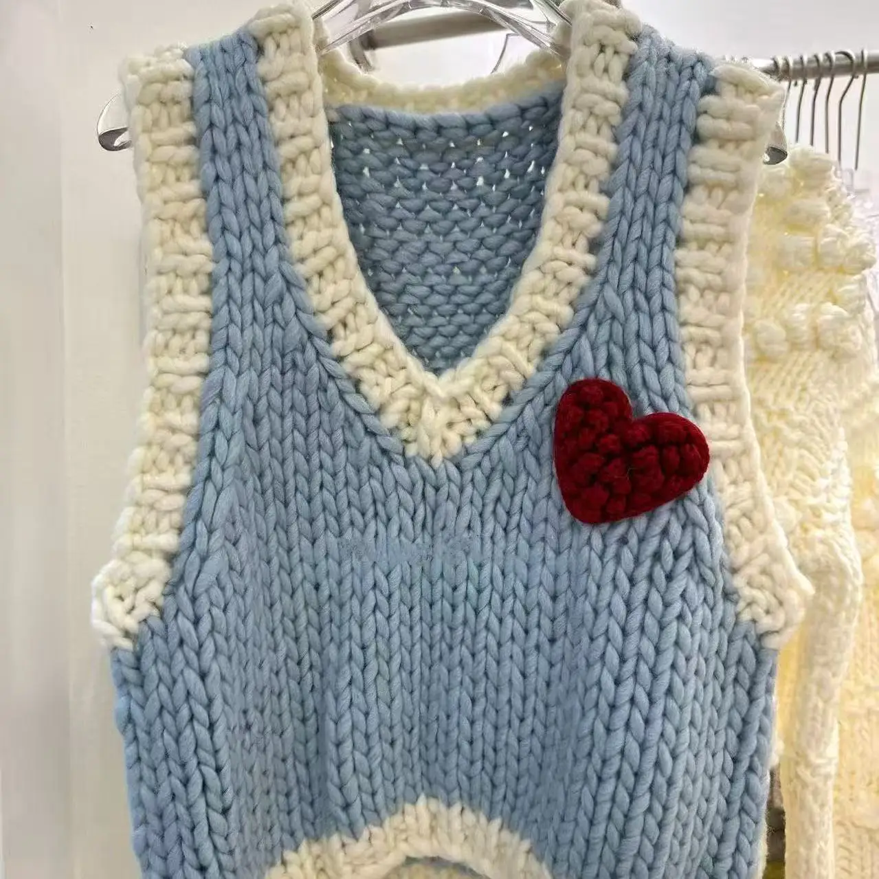 

Clothland Women Sweet Baby Blue Knitting Vest V Neck Sleeveless Knitwear Sweater Waistcoat Female Spring Fashion Tops MA190