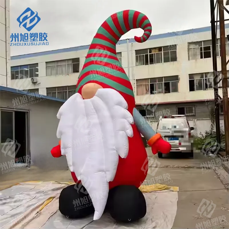 Simpatico Babbo Natale gonfiabile rosso per l'attività festiva della decorazione del centro commerciale quadrato della casa di Natale