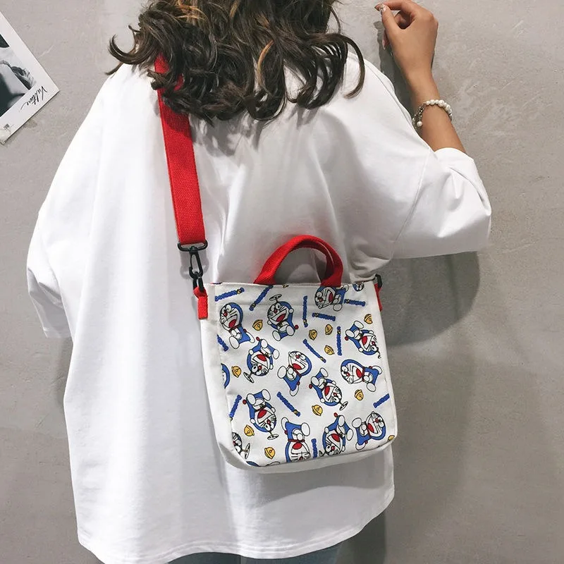 أنيمي عبقور قماش حقيبة كتف للنساء حقيبة كروسبودي Kawaii سعة كبيرة حقيبة يد الفتيات السفر أكياس التسوق عيد ميلاد