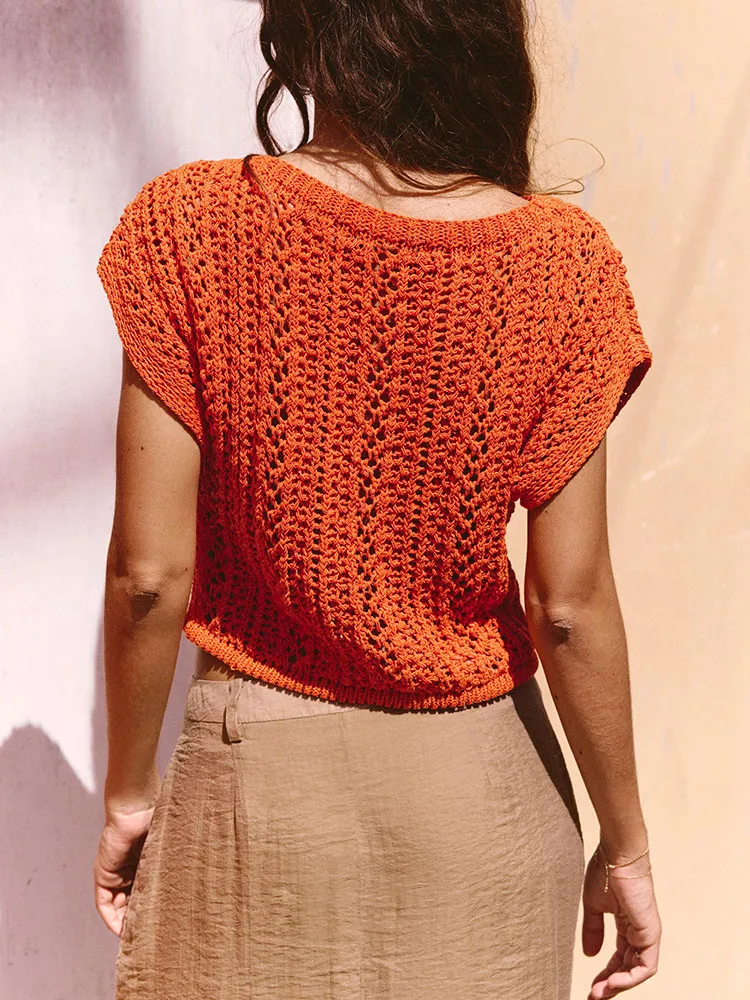 بلوزة نسائية قصيرة مريحة محبوكة بأكمام واسعة مجوفة وياقة مستديرة لربيع 2025، تصميم بسيط جديد بأسلوب عملي بلون موحد