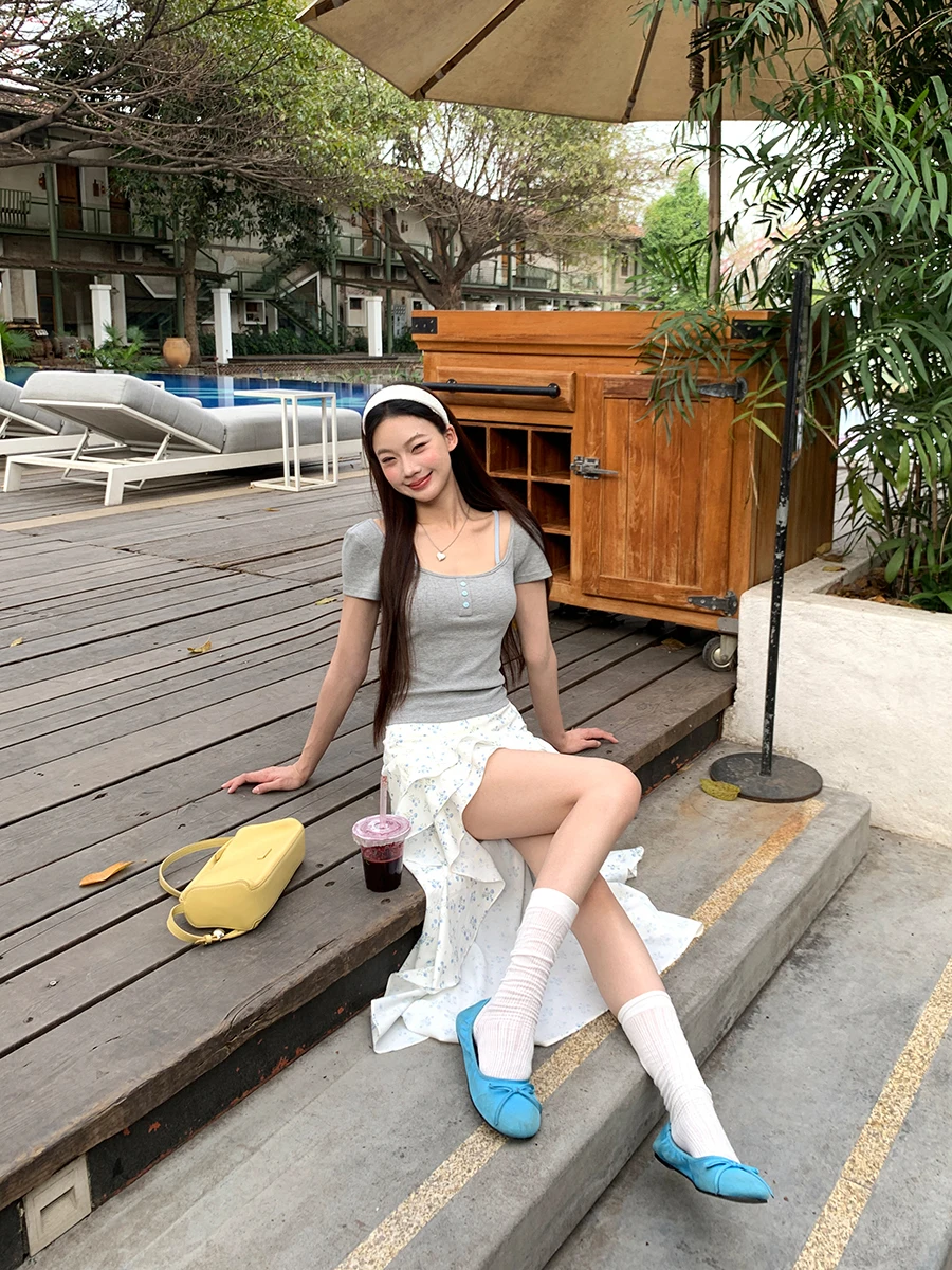 Biała spódnica damska z wysokim stanem, asymetrycznym krojem w kształcie litery A, z kwiatowym nadrukiem, nowa letnia spódnica z wysokim stanem, spódnice damskie.