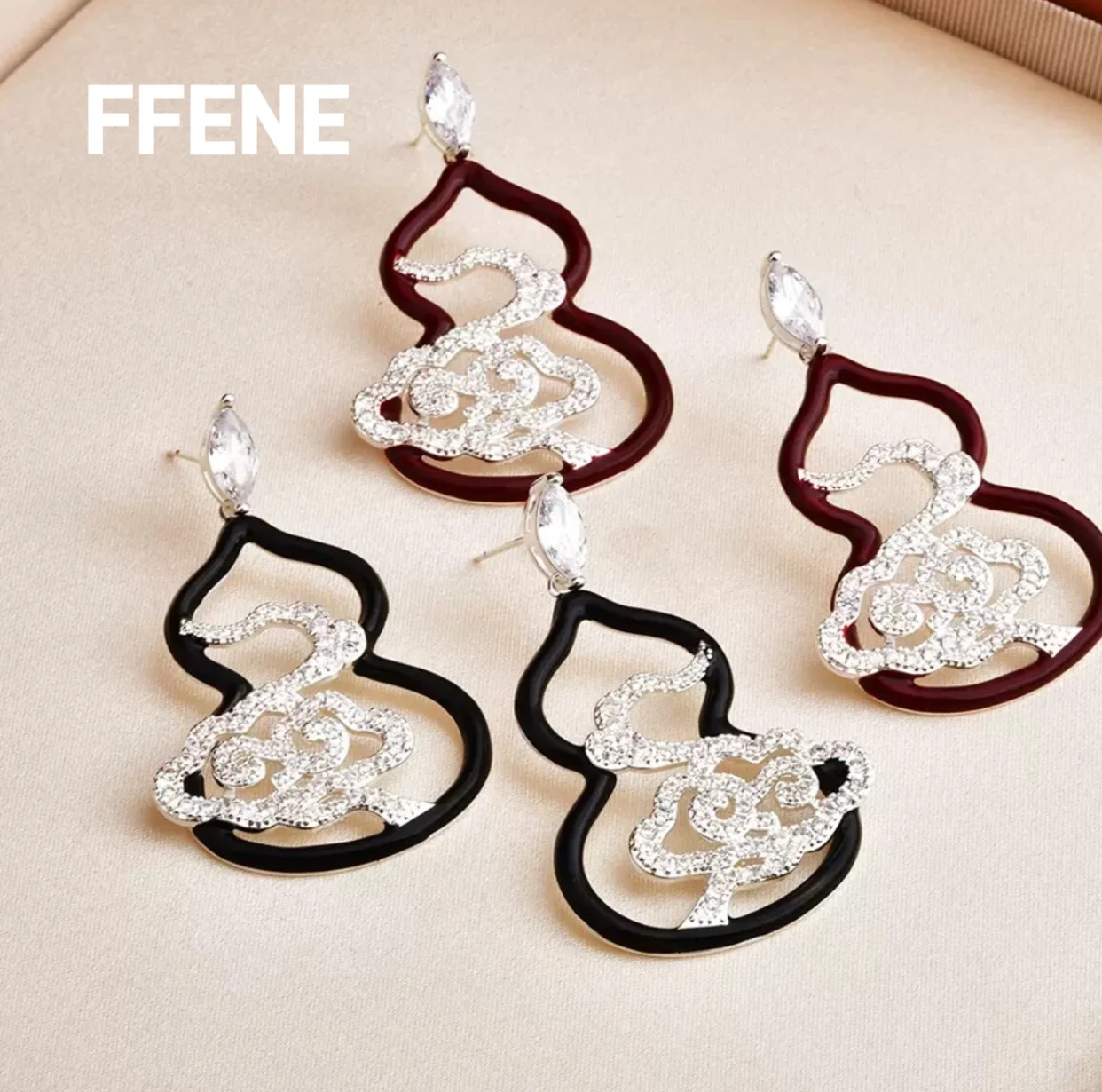 

[Good luck] Hollow all-diamond cloud black drip oil gourd earrings luxurious design temperament personality earring