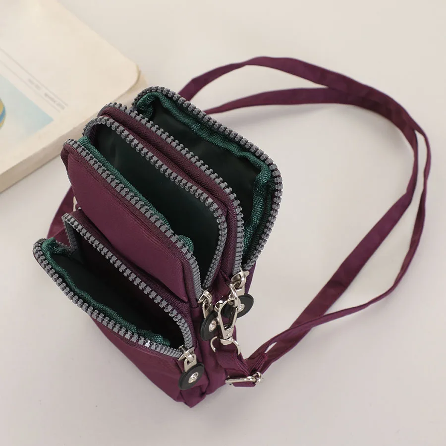 حقيبة كروس نسائية عصرية محمولة بسحاب ثلاثي من النايلون بلون سادة للجري اليومي ومتينة وعالية الجودة للهاتف الخلوي