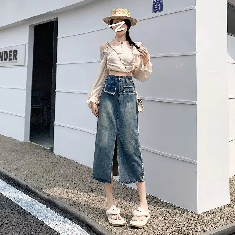 LEDP Women Denim Skirt High Waist Retro Long Skirt Split Hip Female Fashion Stretch Design Sense Long Bag Hip Skirt.