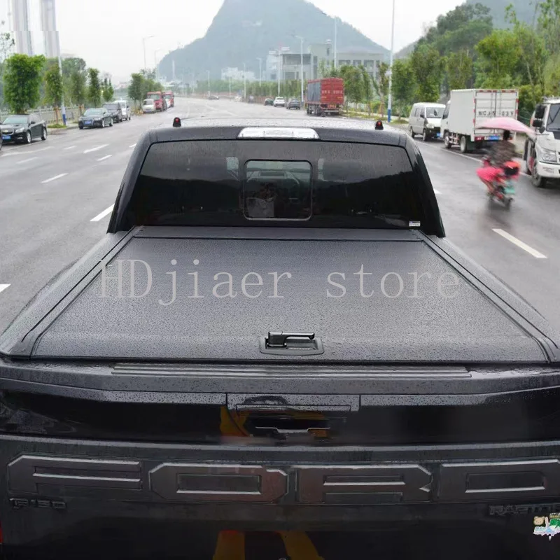 

Roll-up tonneau covers for pickup trucks such as the Raptor F-150 and Ford Ranger