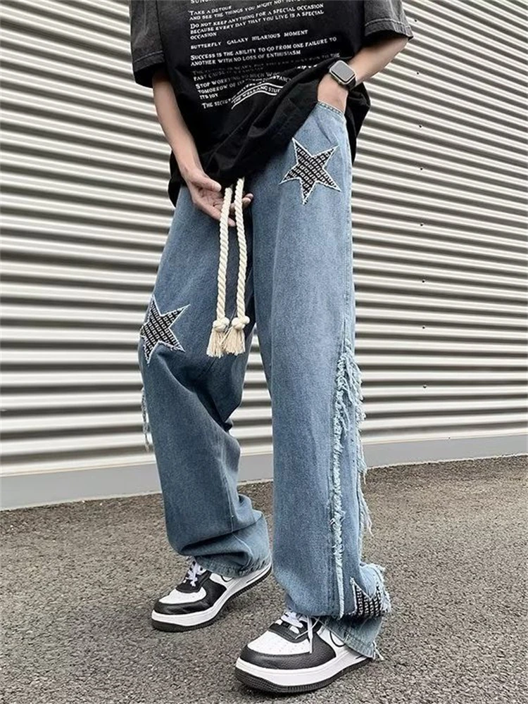 Patchworkowe męskie jeansy Streetwear Retro haftowane frędzle proste nogawki luźny dżins spodnie męskie sznurek dżinsowe workowate spodnie