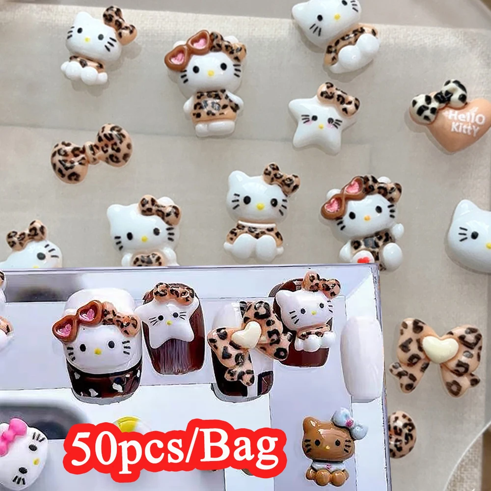 50 teile/beutel Leopard Print Hallo Kitty Nail art Charms 3D Kawaii Harz Herz Sonnenbrille KT/Bogen Nagel Dekor DIY mode Nagel Teile