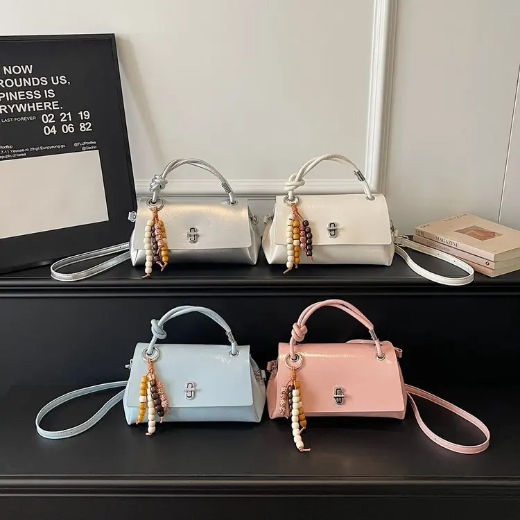 

Дизайнерская винтажная сумка для подгузников для женщин, элегантная сумка через плечо, роскошная минималистичная сумка-тоут из текстурированной кожи, оригинальная ретро-сумка.