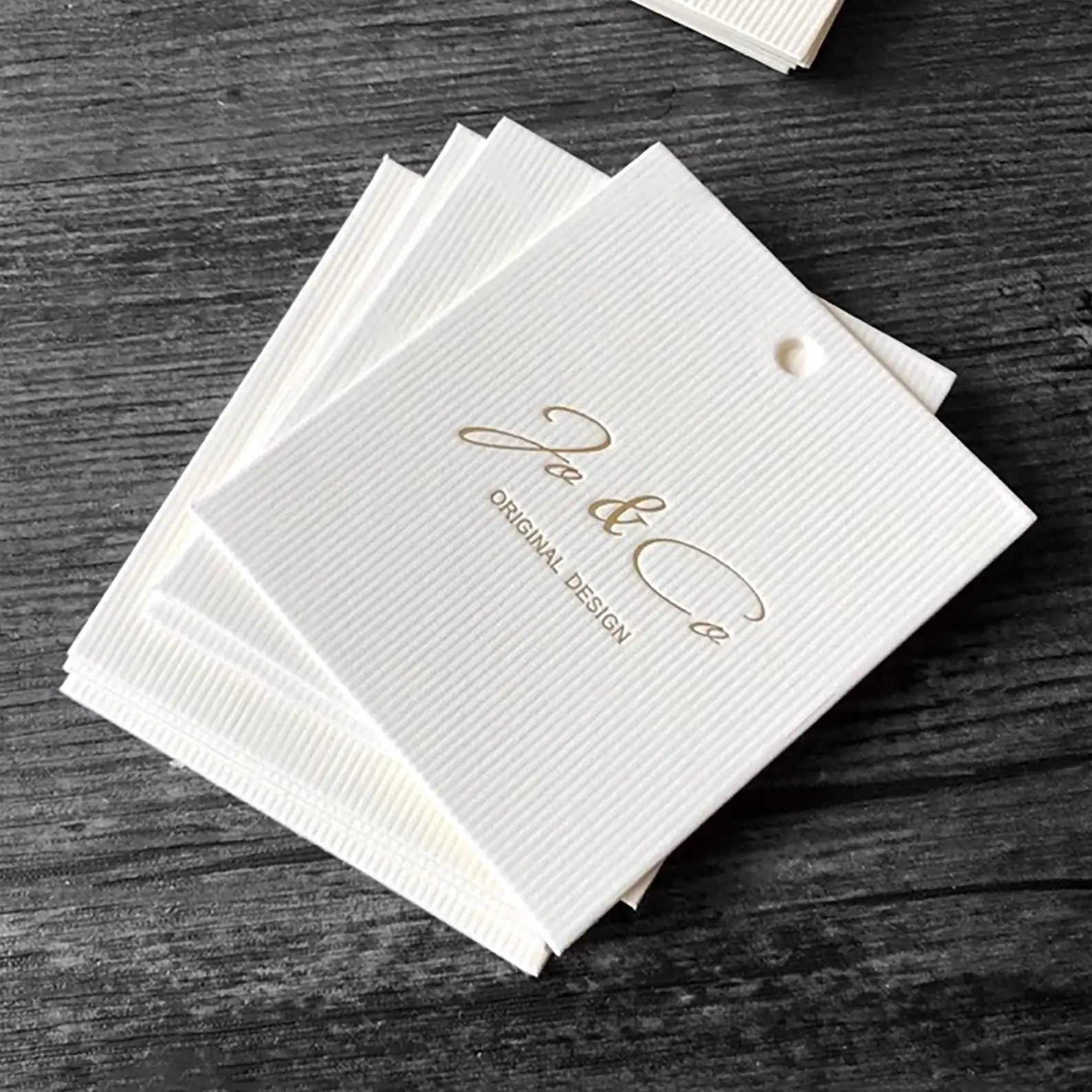 

Custom Luxury Embossed Logo Hang Tags, Custom Brand Price Labels for High-end Clothing, Bags and Shoes