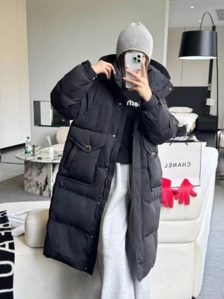 Piumino lungo invernale 2025New Coreano di alta qualità con cappuccio sciolto resistente al freddo Parka da donna addensare caldo piumino d'anatra bianco
