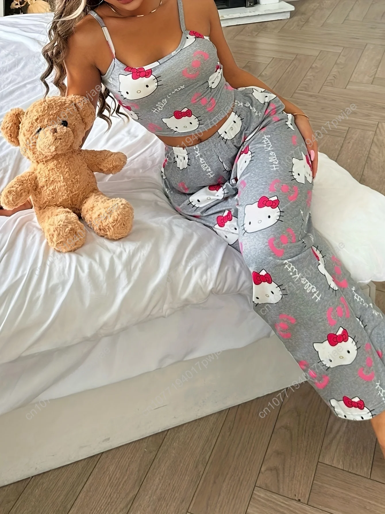 

Sanrio Women'S Sleeveless Printed Crop Top with Straight Elastic Long Pants for Sleep.