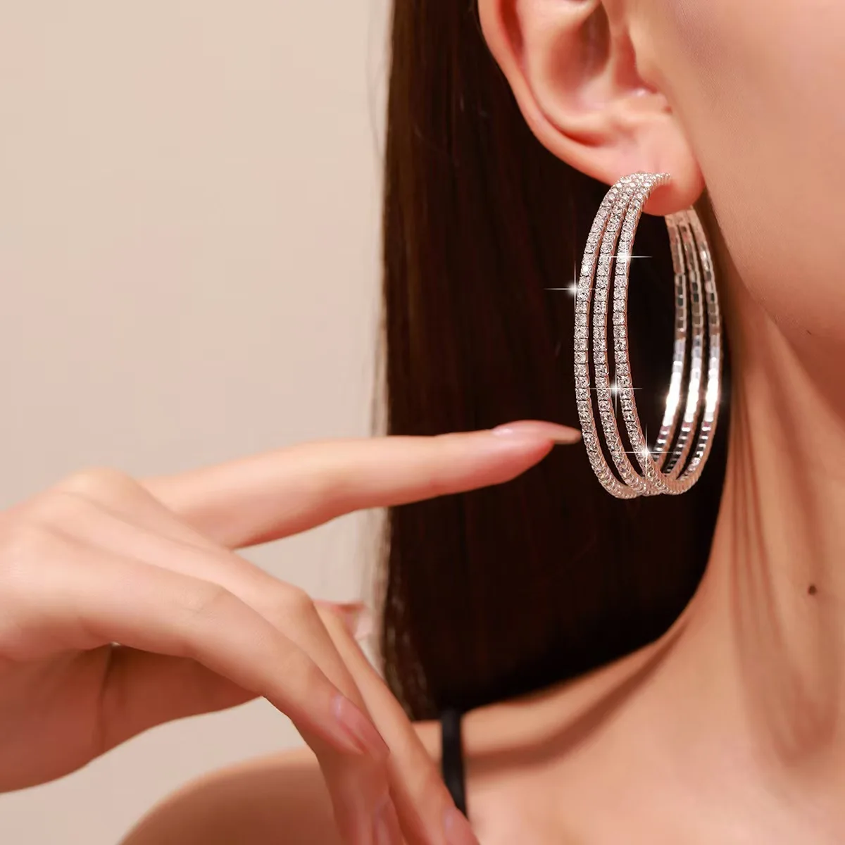 A pair of European and American fashion statement earrings with alloy and rhinestone craftsmanship, featuring large round hoop d