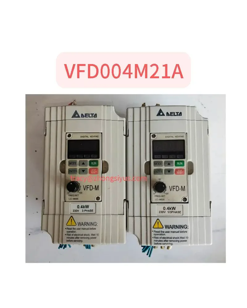 

Used frequency converter 400W single-phase input VFD004M21A tested OK, in stock