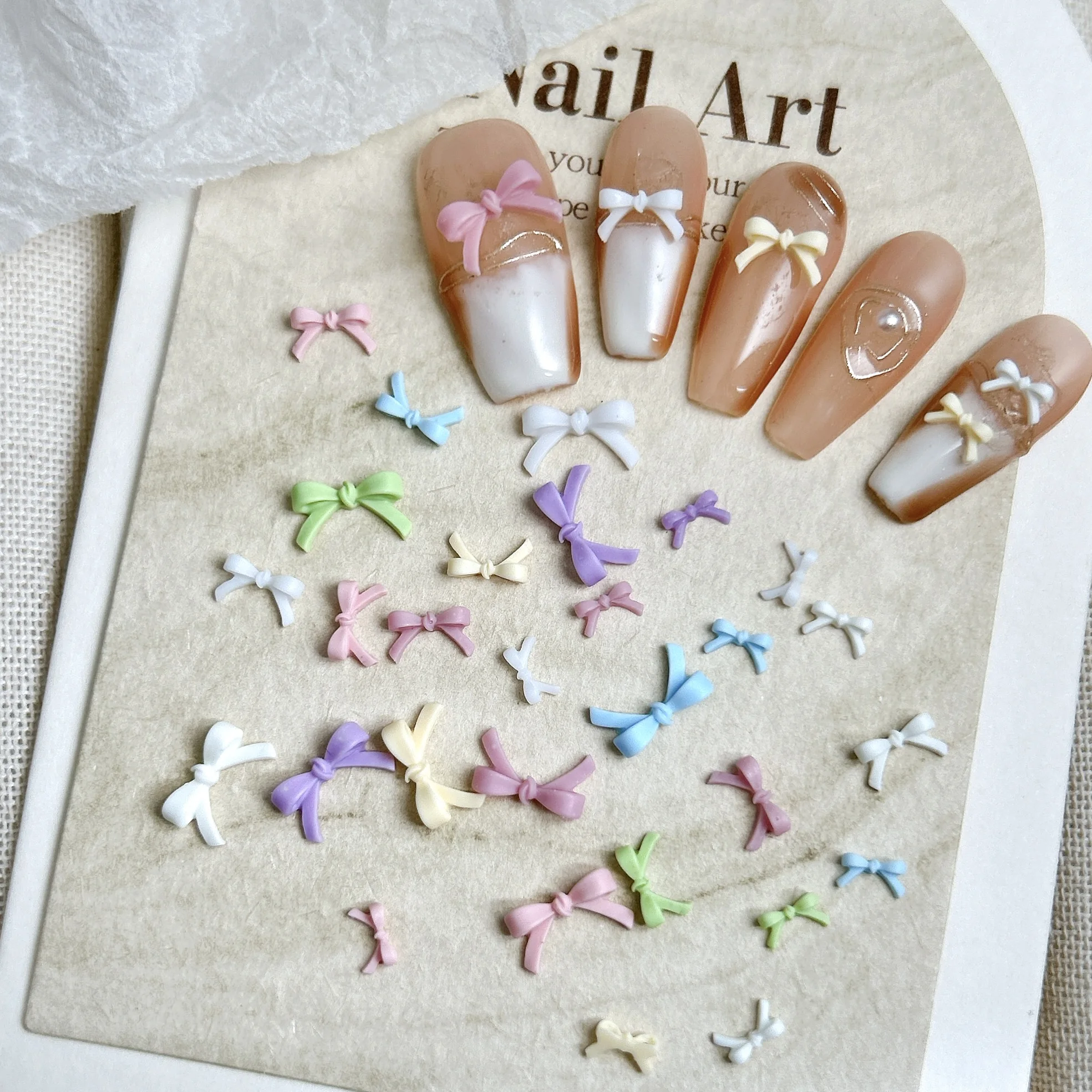 50PCS Einfarbig Linie Bowknots Harz Nagel Charms Minimalistischen Mini Schöne Bögen Nail art Zubehör für DIY Süße Nägel liefert