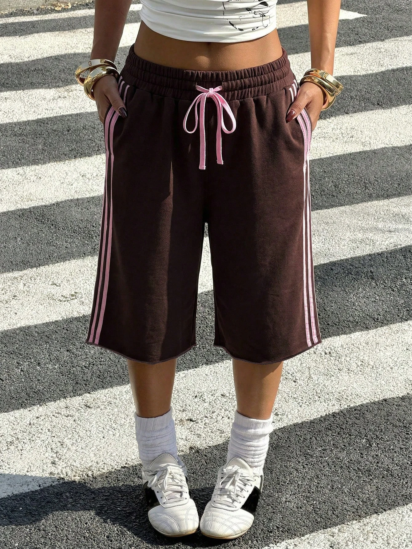 NUOMICI American-style streetwear wide-leg cropped pants featuring side lacing and slits—a minimalist, classic design.