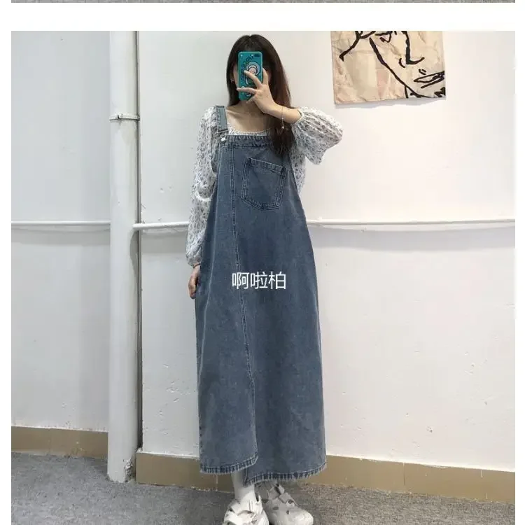 

Shoulder Strap Skirts. A New Spring and Autumn Retro Loose and Personality Long Halter Dress with Irregular Slit Denim Straps.