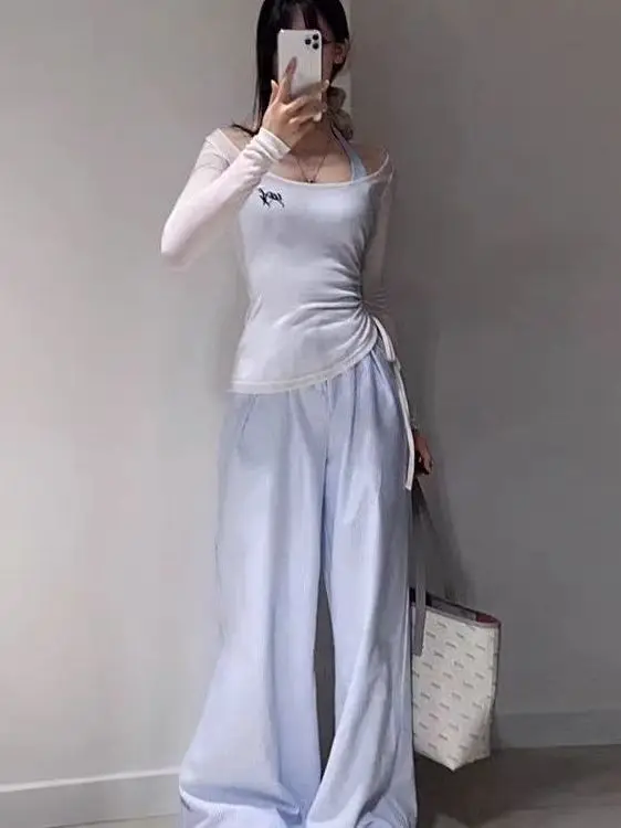 Conjunto de peças de camiseta sensual irmã coreano puro desejo cintura costurado transparente pendurado ne colete emagrecimento calças azuis