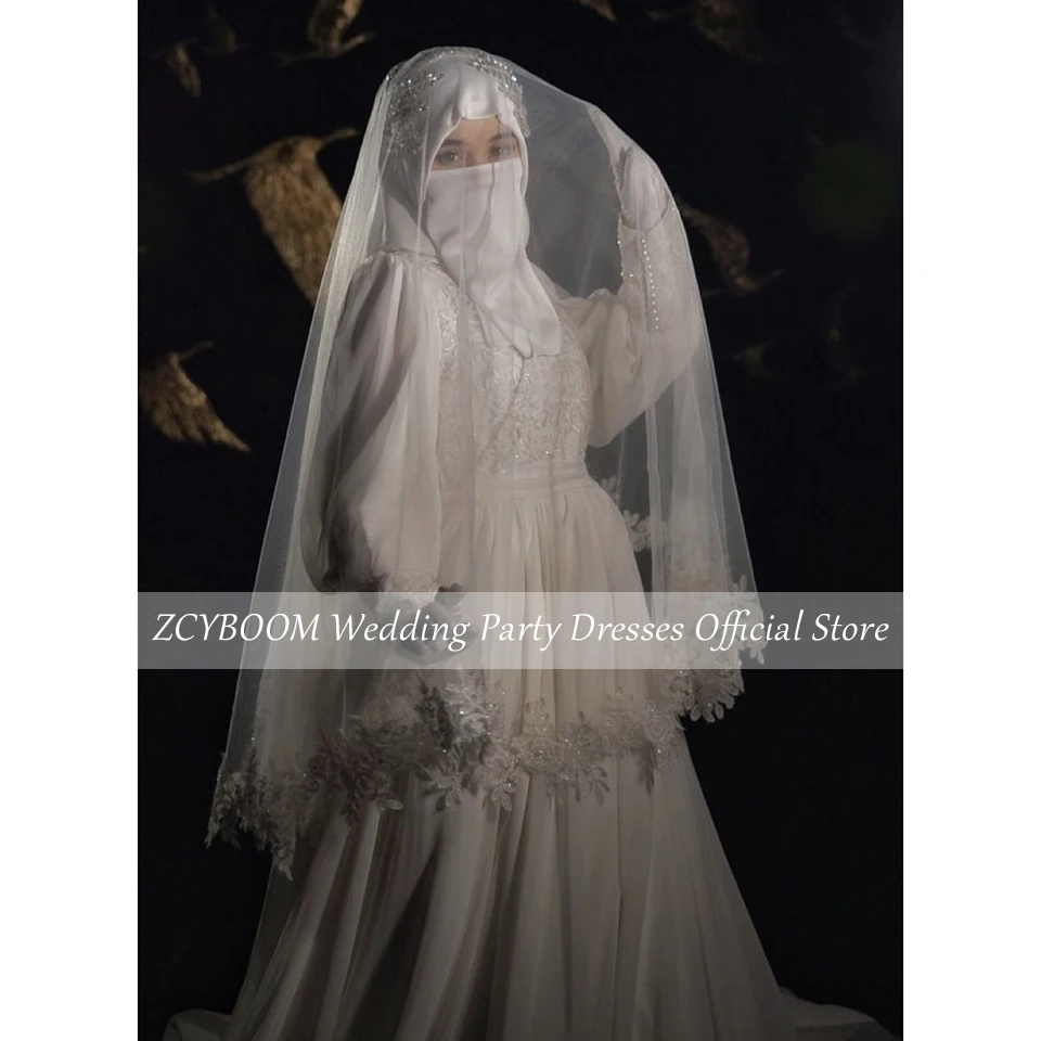 Suknia ślubna muzułmańska z wysokim dekoltem, cekinowymi aplikacjami, koralikami, długimi rękawami, kokardą, długością do podłogi i trenem zamiatającym, model 2025, szyta na miarę.