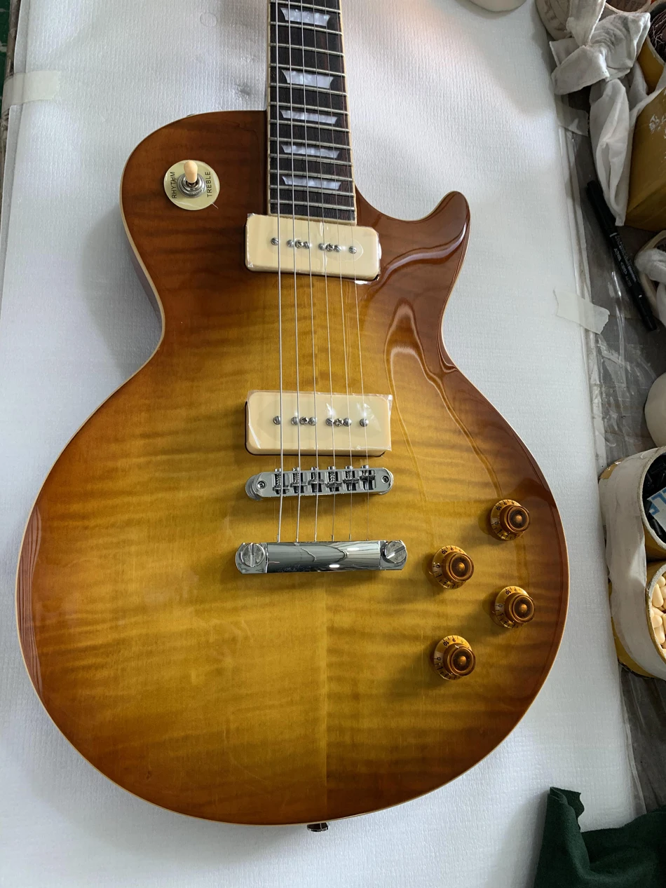 

electric guitar one piece body & neck,Rose wood fingerboard, chrome hardware, frets edge binding，tone-pro bridge