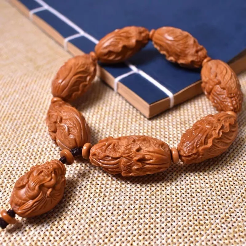 Olive stone bracelet cabbage and motifs, hand-carved by Nan Gong artisans, paired with a God of Wealth pendant, unis