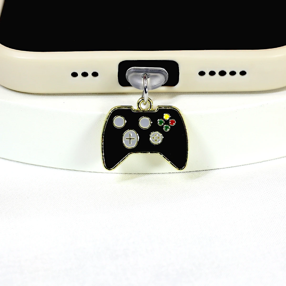 Mobile phone dust plug, game enthusiast's small gift, interesting alloy game console controller pendant, pendant accessory