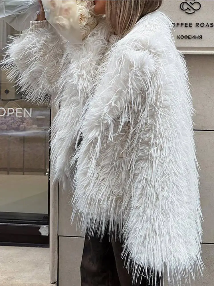 Luxury Brand Lapel Tassel Fluffy Fur Coats Women Autumn Winter Faux Fur Jacket Warm Design Long Sleeve Tops Loose Casual Coats
