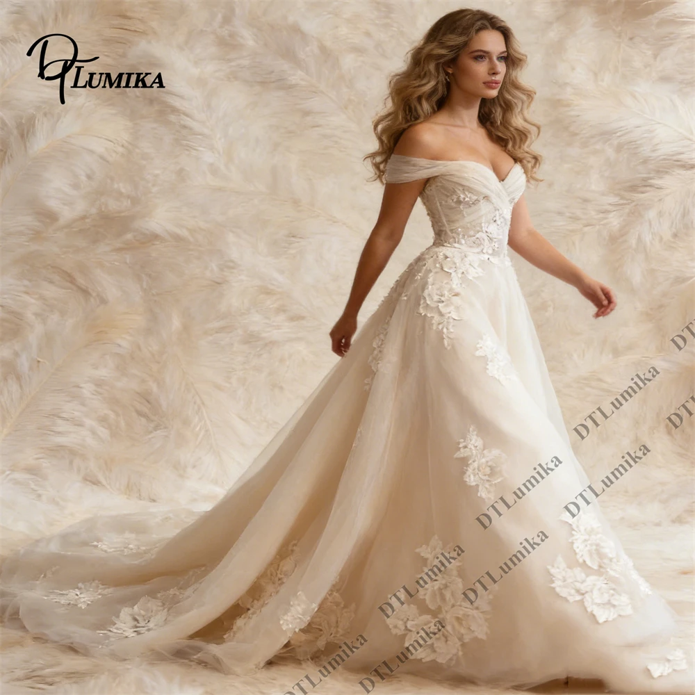 

Ivory Ball Gown Wedding Dress with Off-the-Shoulder Floral for Beach Elopement Pre-Wedding Shoot Stunning Photogenic Bridal Gown