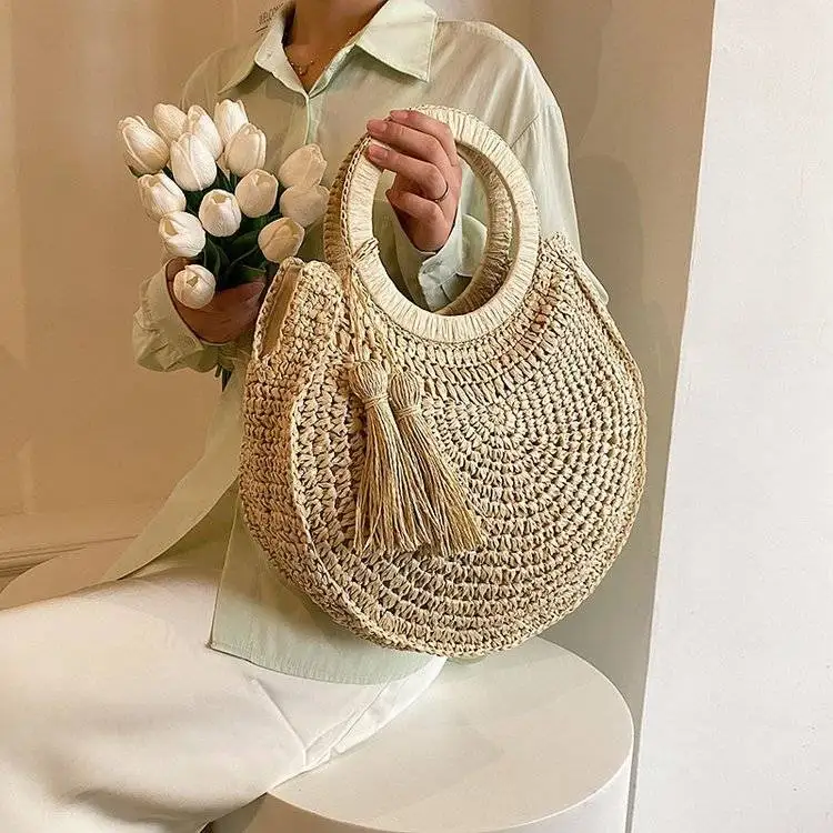 

Beach Vacation Leisure Handheld Bag For Women 2023 Summer Simple Woven Straw Woven Bag With Tassel Design One Shoulder Women Bag