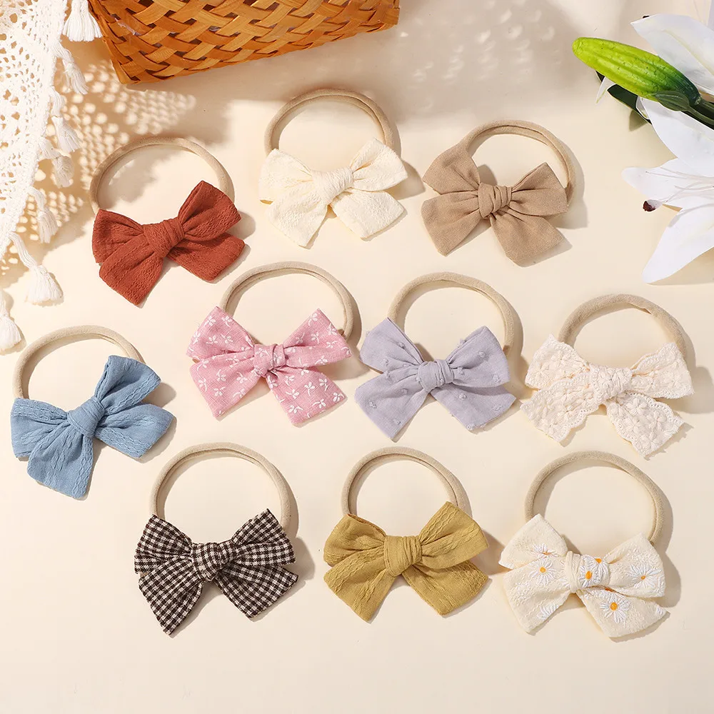 

10 шт./компл., эластичная повязка на голову с бантиками для маленьких девочек, нейлоновая повязка для волос с принтом, милые милые головные уборы для новорожденных, аксессуары для волос, подарки