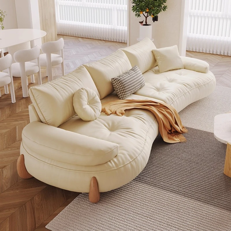 

Log cream wind sofa living room 2025 new simple Japanese straight row small apartment cat scratch fabric curved sofa