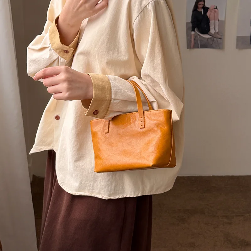 

2026 New Mini Vegetable-Tanned Cowhide Tote Bag, Relaxed Retro Handheld Basket Crossbody Bag