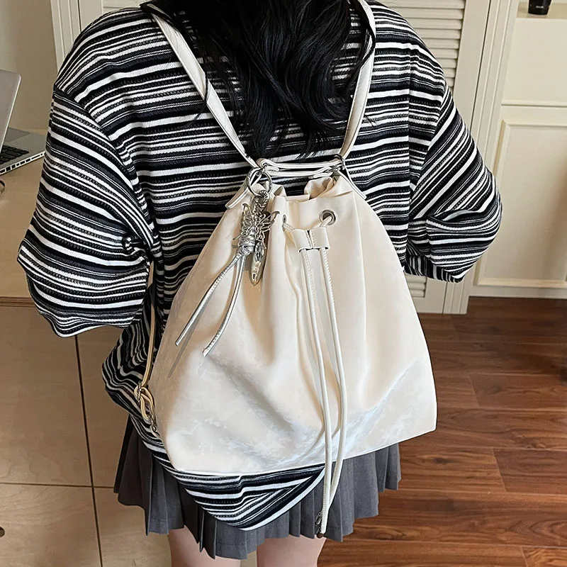 

Large capacity drawstring bucket bag, simple and versatile backpack, women's 2025 summer new college student class backpack