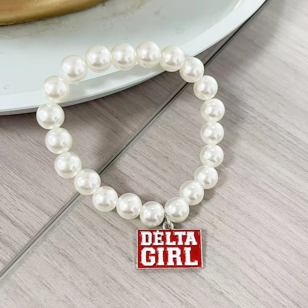 10MM all-white pearl red and white Delta Girl pendant elastic bracelet
