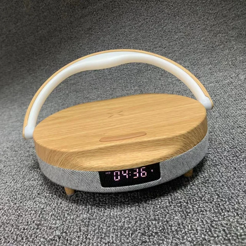 ลำโพงบลูทูธมัลติฟังก์ชันพร้อมชาร์จไร้สาย LED ข้างเตียงไฟกลางคืนที่ชาร์จไร้สายโทรศัพท์มือถือ