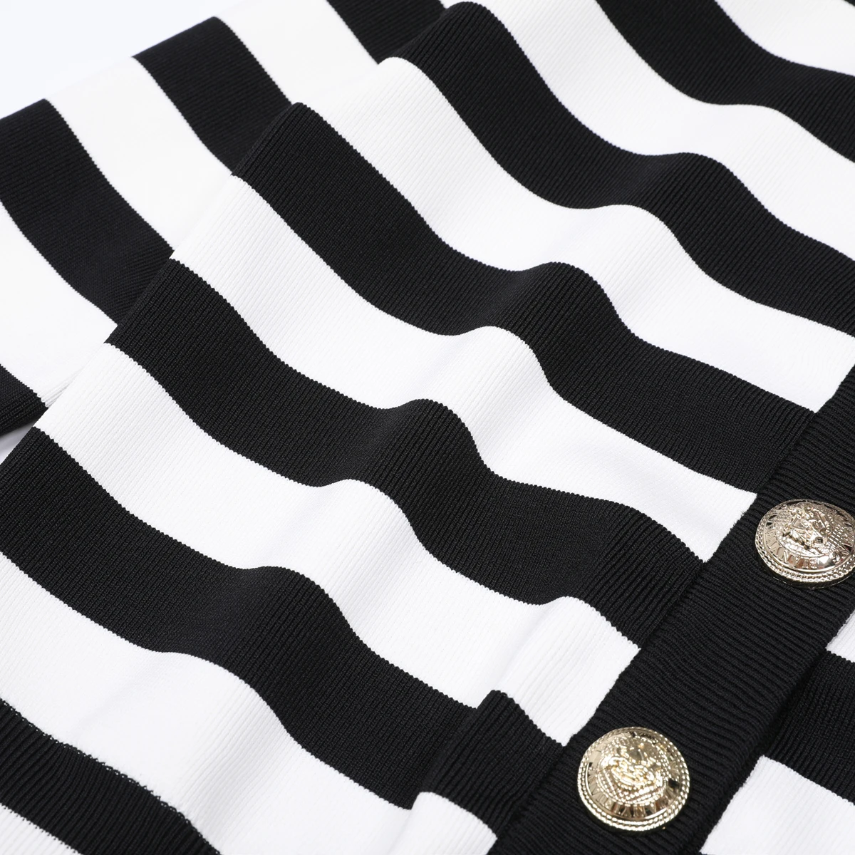 Haute qualité automne nouveau rayé à la mode tempérament déplacements femmes tricoté à manches longues col rond Cardigan haut veste