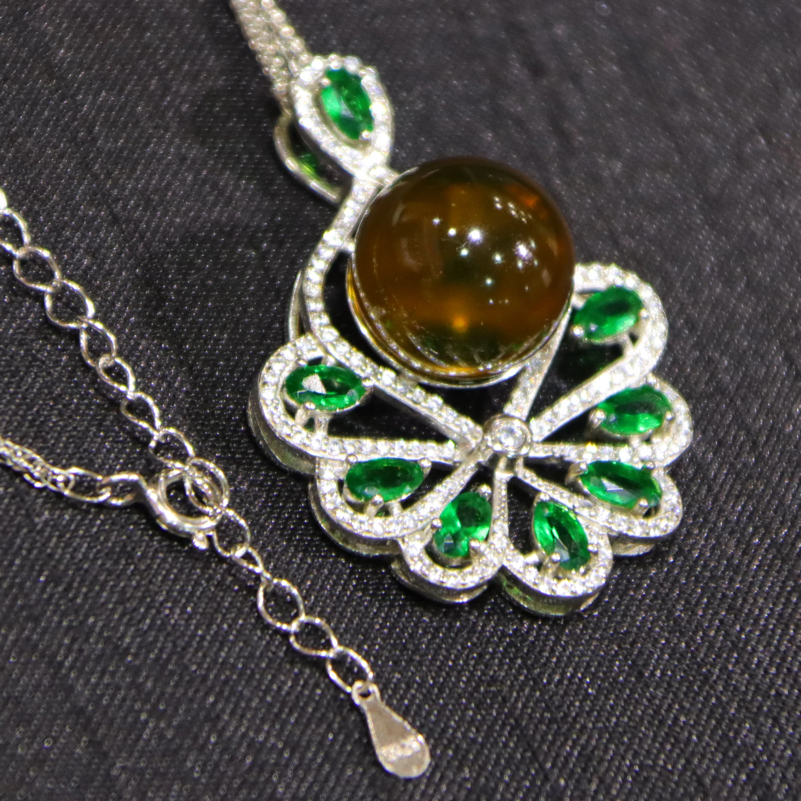 Pure Silver Necklace with Natural Mexican Blue Amber Pendant 13mm Surrounded by Green Gemstones on Sterling Silver Chain