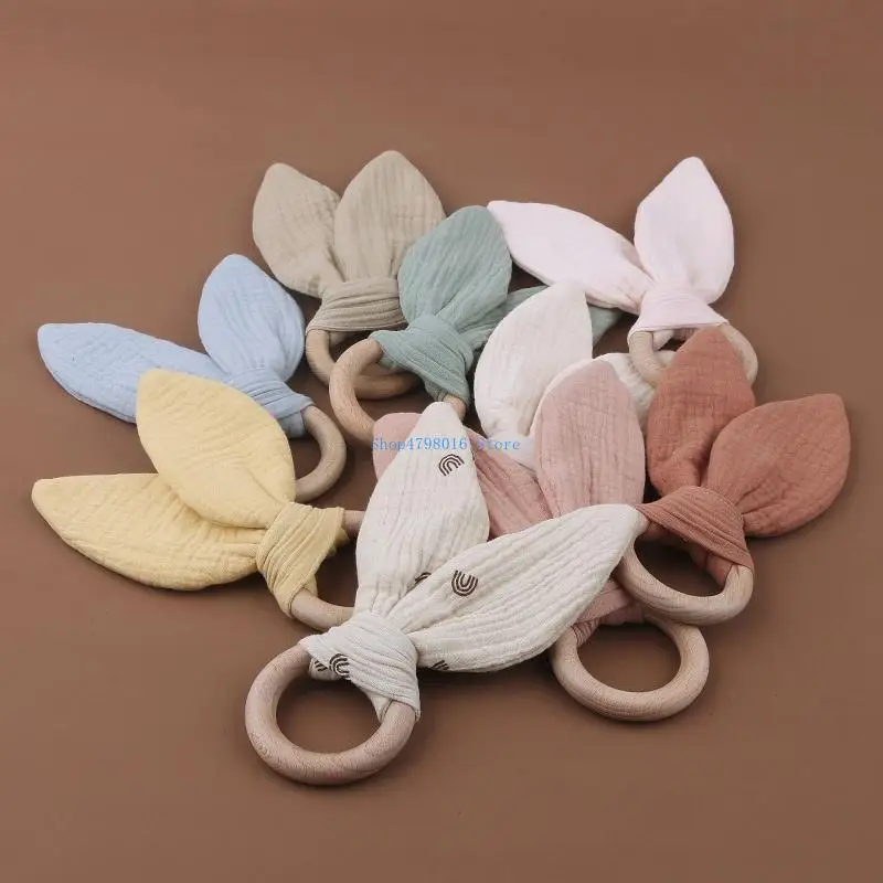

Wooden Baby Teether Cotton Cloth Teething Ring Rattle Toy for Newborn Boys Girls Appease Chewing Gift