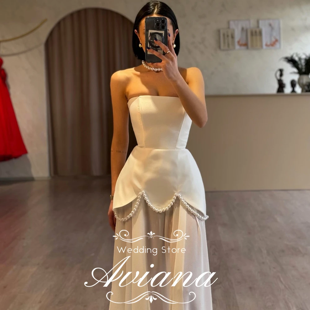 Aviana Customized Strapless Elegant Satin Wedding Gown Featuring Exquisite Pearl Trimmed Peplum Detail Transparent Sheer Skirt