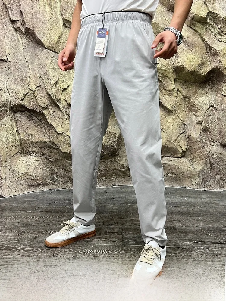 

Business Travel Men's Quick Dry Casual Pants Breathable Ventilation System Dot Array Glued Polyester And Spandex