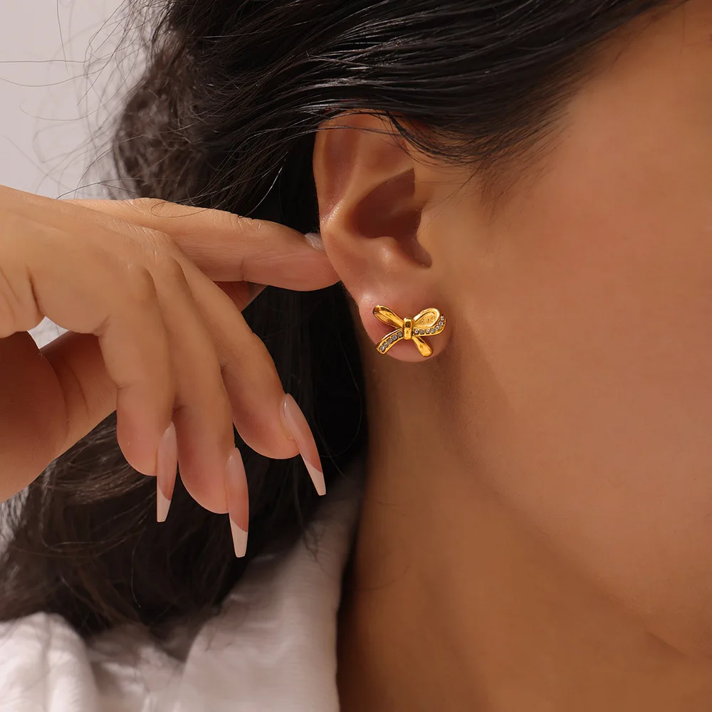 

Bow design, niche temperament, elegant titanium steel gold-plated earrings