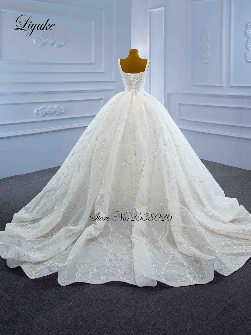Liyuke مخصص الحبيب السباغيتي الأشرطة الكرة ثوب الزفاف من يزين مذهل الدانتيل التنانير الزفاف