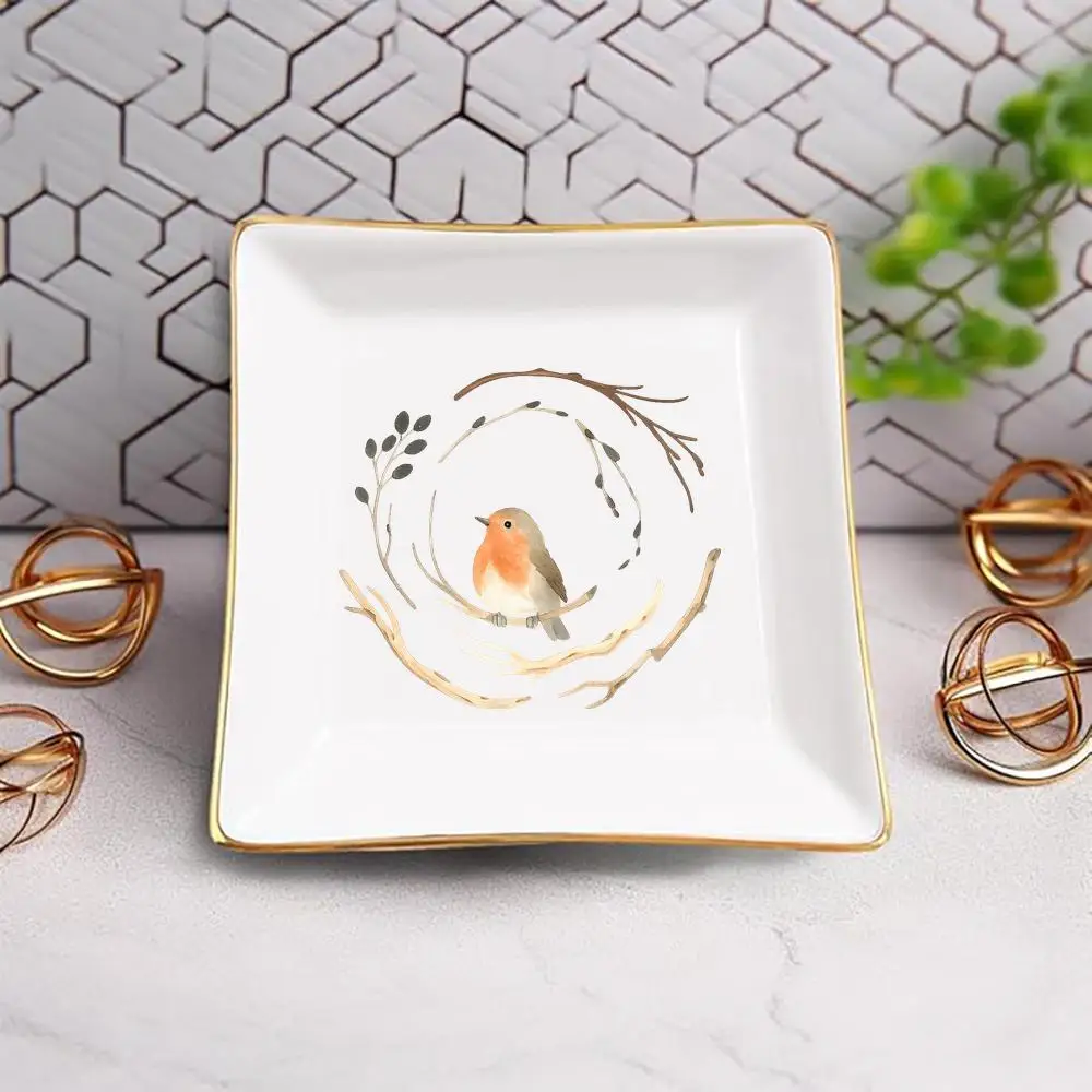 

A Decorative Ceramic Tray Featuring a Small Bird Perched on a Branch - Stylish Home Decoration, Organizer for Jewelry, Key Holde