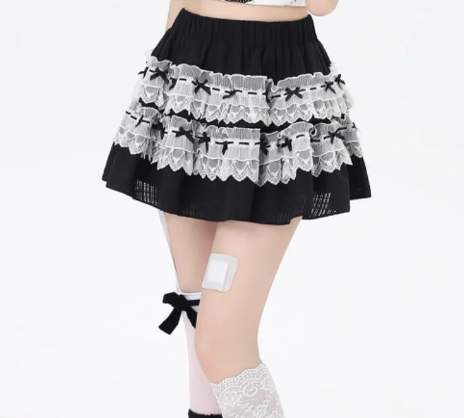 กระโปรงลูกไม้สีดำขาวสไตล์ญี่ปุ่นน่ารัก ดีไซน์โบว์  กระโปรงทรงเค้กเอวสูง  แฟชั่นฤดูใบไม้ผลิและฤดูร้อน  ใส่ได้หลากหลาย  ช่วยให้ดูอ่อนวัย