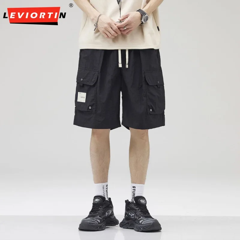 กางเกงขาสั้นคาร์โก้ผู้ชายสีทึบระบายอากาศได้ดีบางบางมีกระเป๋าหลายกระเป๋าใส่ทำงานลำลองฤดูร้อน