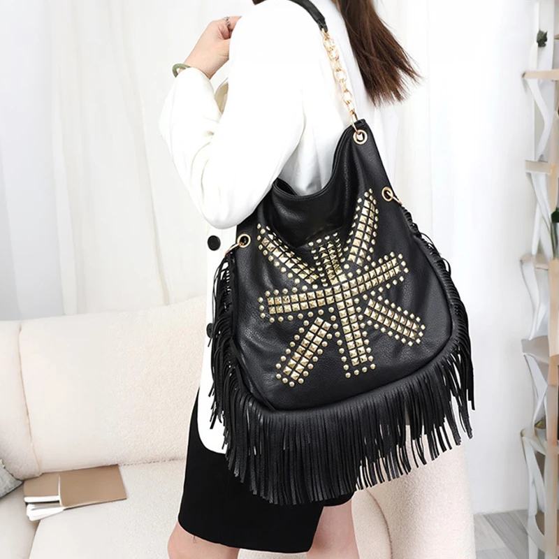 

Fashionable, simple and versatile tassel rivet hand-held shoulder bag, large capacity rock punk commuting shopping bag