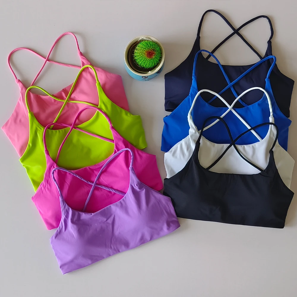 Sujetador deportivo suave de color sólido para mujer, ropa interior de Yoga y gimnasio con espalda cruzada, entrenamiento atlético ajustado con almohadilla para el pecho